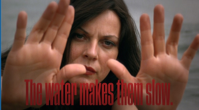 The water makes them slow — submerged text dissolving beneath the surface